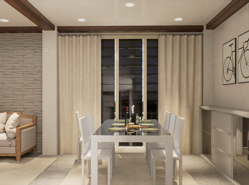 Dining area with six-seater table and framed art.