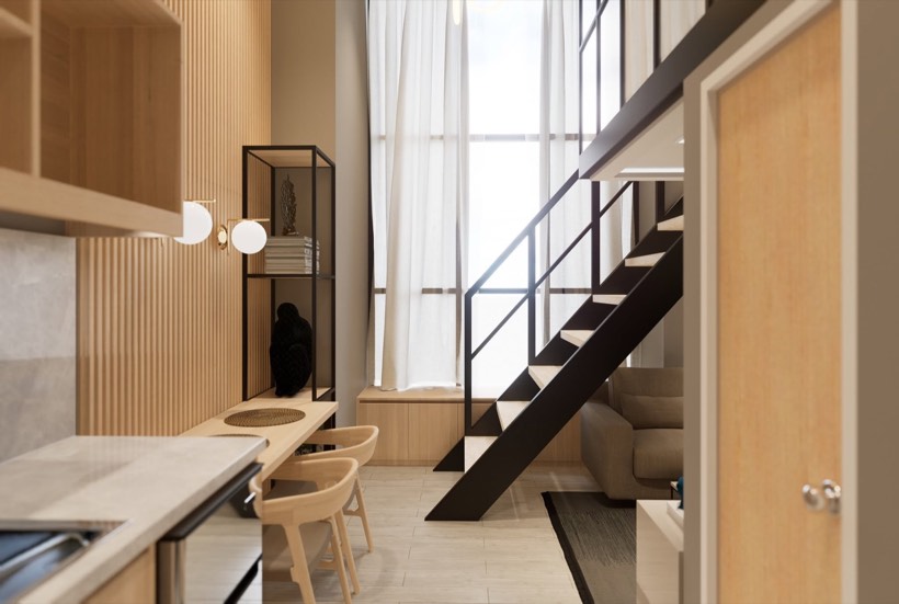 Loft kitchen with fluted timber wall.